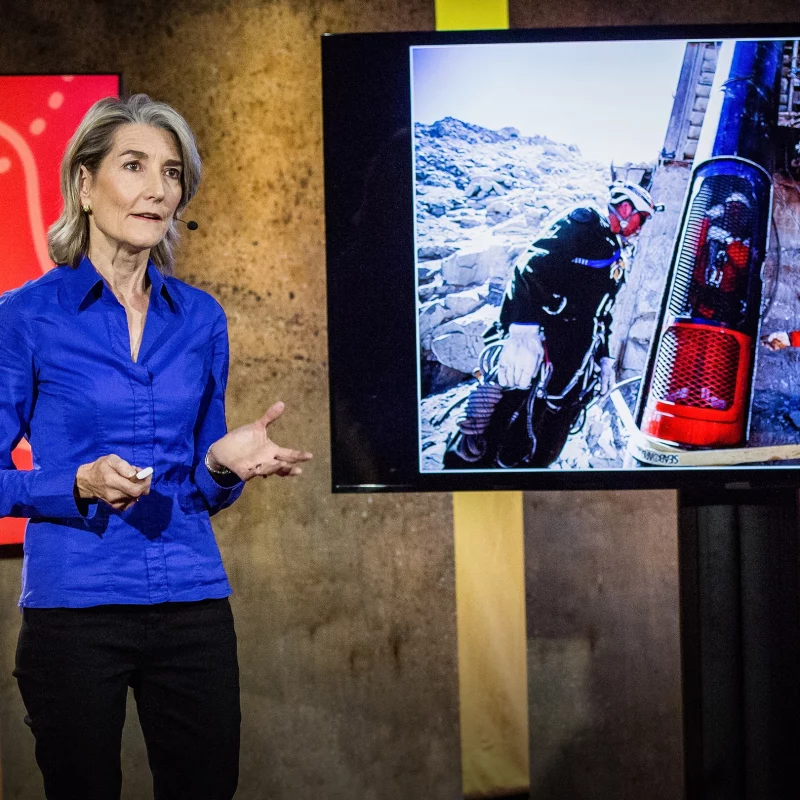 Screenshot of Amy Edmondson's TED Talk on psychological safety, showing her speaking on stage beside a television.