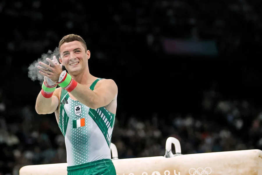 Olympian Rhys McClenaghan clapping after his event at the Paris 2024 Olympics