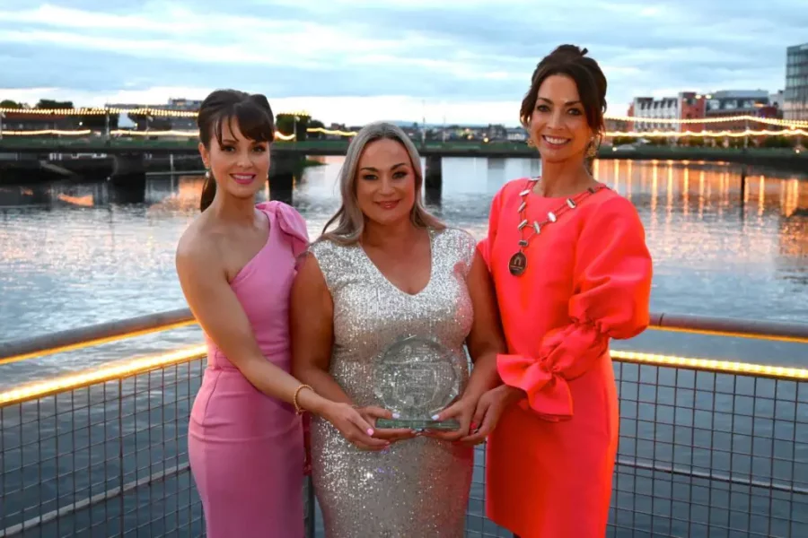 Denise O'Brien being presented with her Solo business woman of the year award