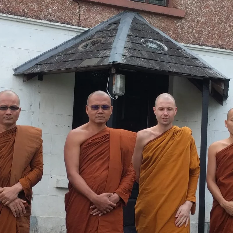 Monks stood in front of the Sunyata Centre